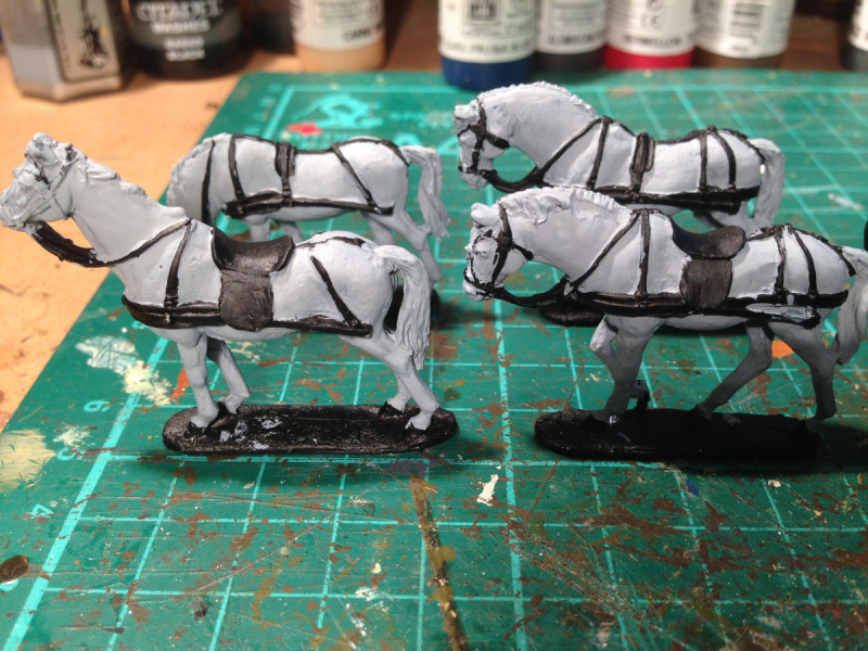 The horses get their first coat of paint.