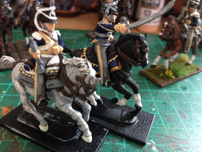 Trumpeter & officer of the 11th dragoons await the final details to be painted.