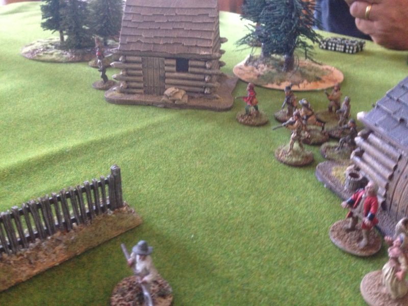 Militia take up position to defend the houses