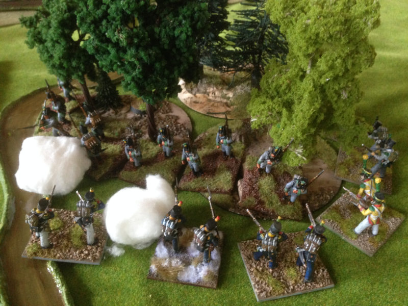 Skirmishers engage at the woods edge.