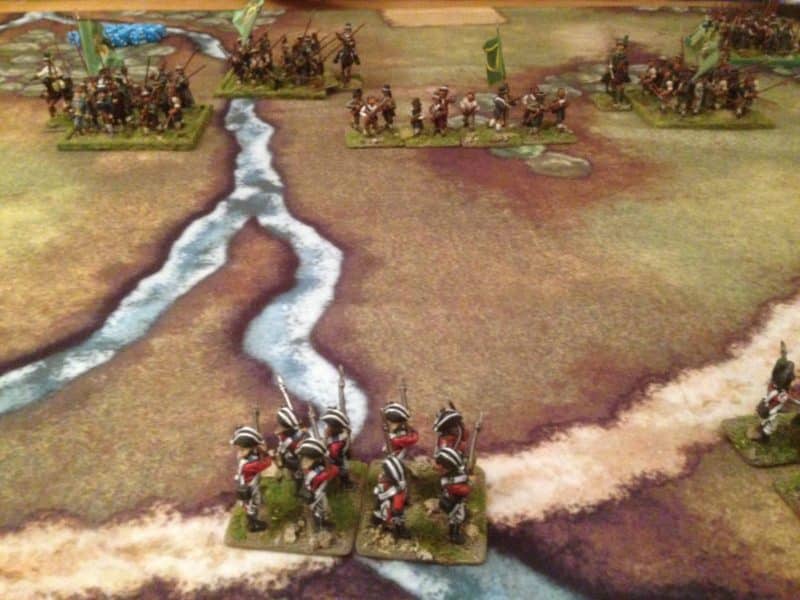 A British force observes the Itish Rebels as they advance!
