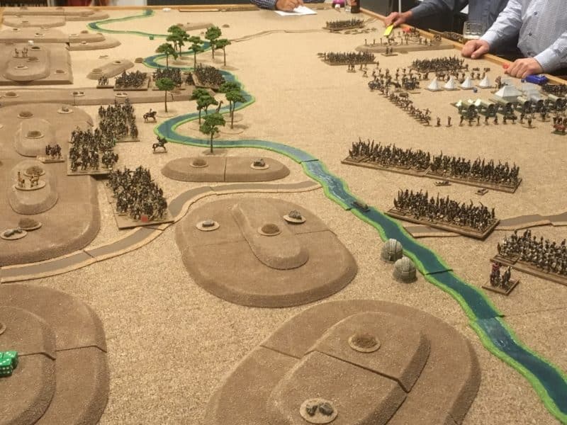 The chest and the loins begin their advance on the camp. The right horn of the Zulu army moves ever closer whilst the struggle on the left continues.